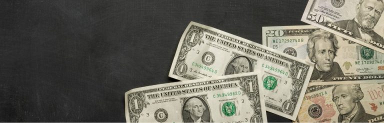 American money on a black background.